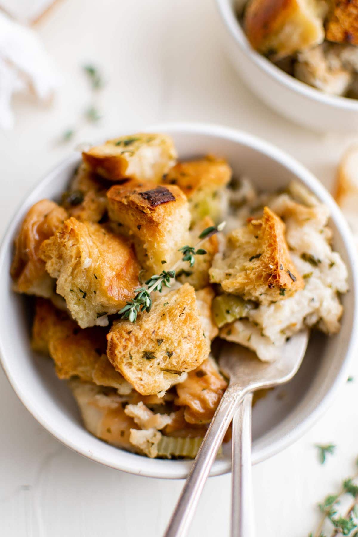 bowl of homemade stuffing with two forks