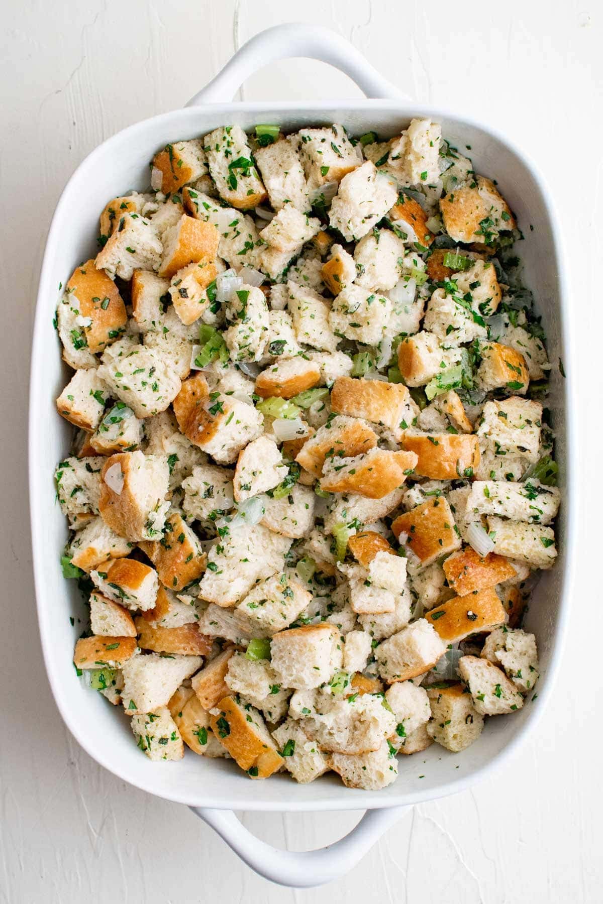 baking dish with unbaked stuffing mixture