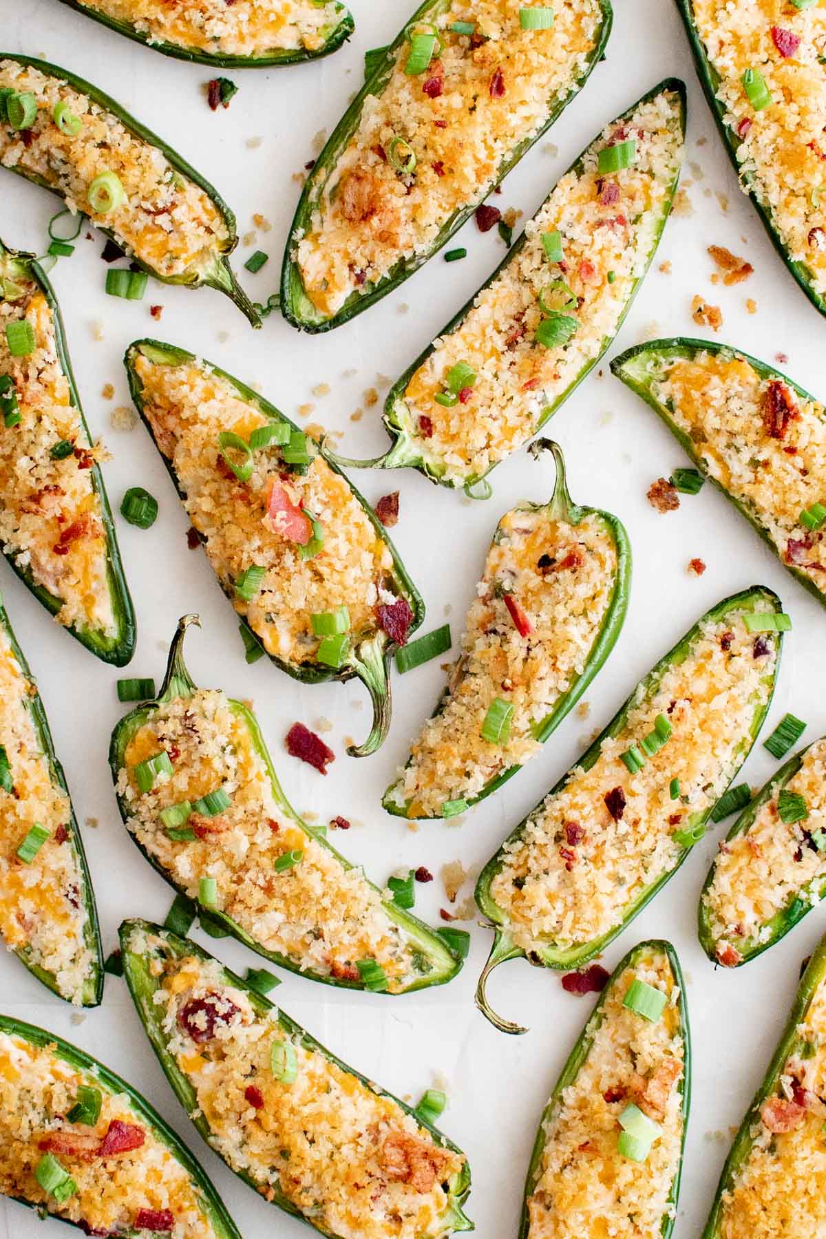 jalapeno popper halves on a tray