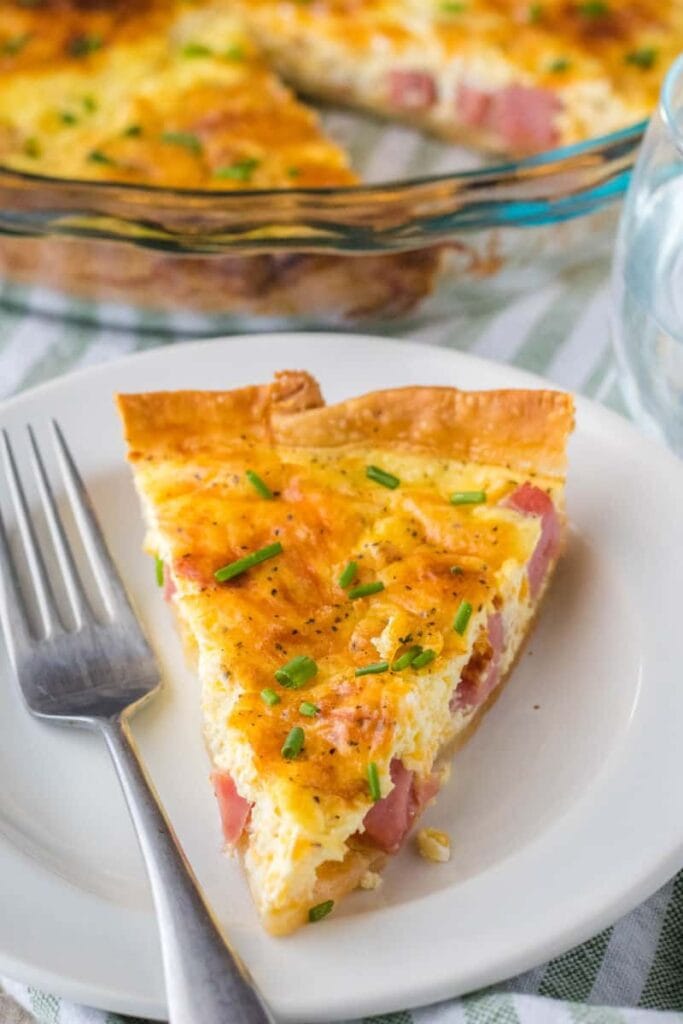 slice of ham quiche on a plate
