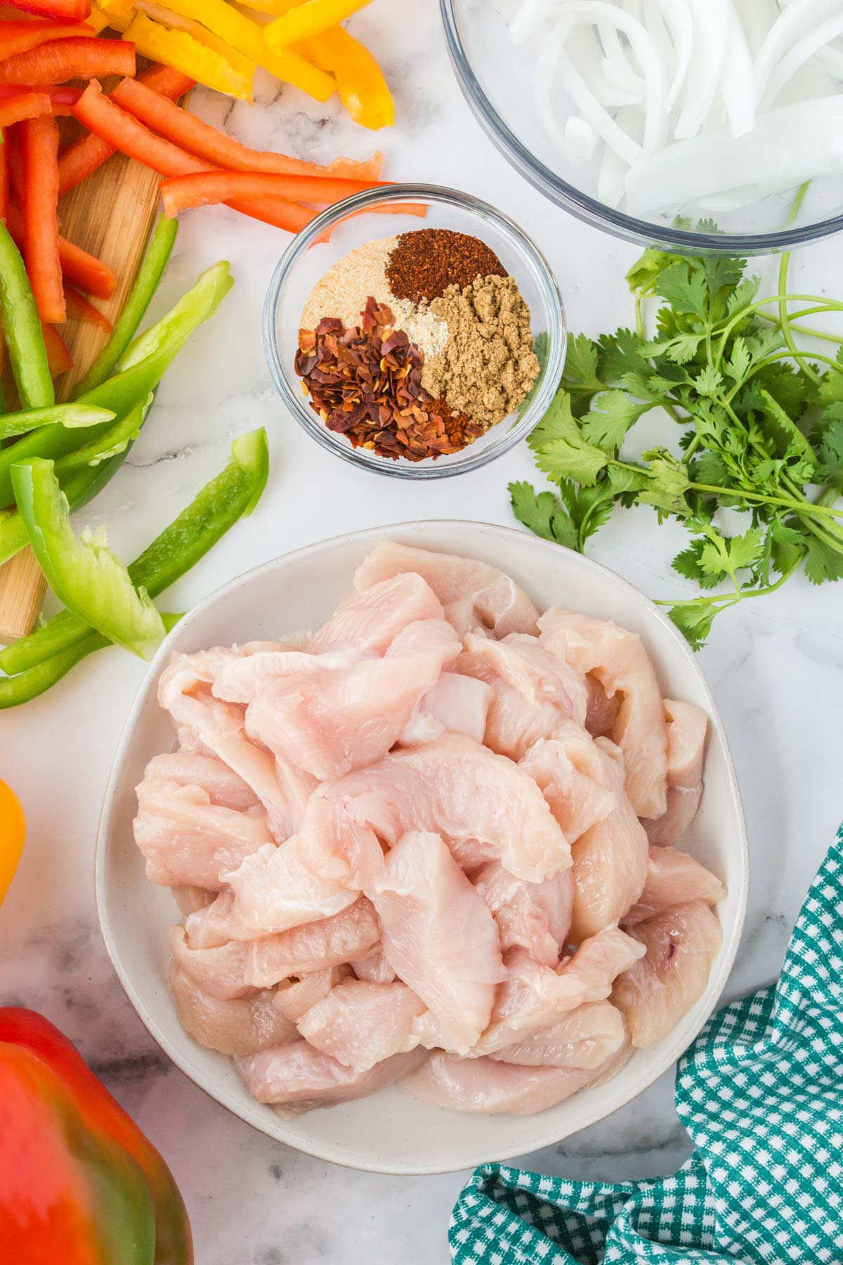 raw chicken breast, bell peppers, spices