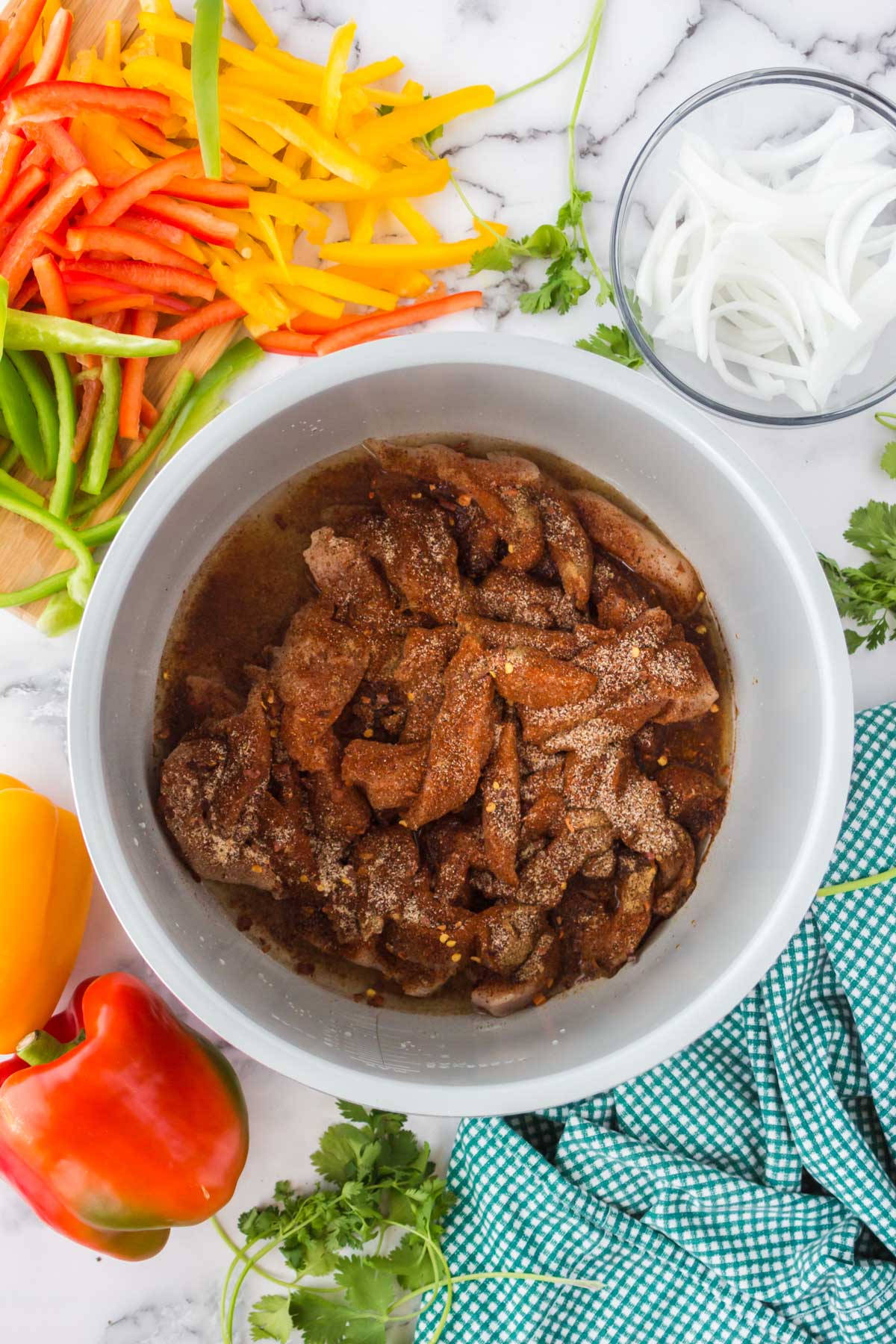 chicken and spices in instant pot