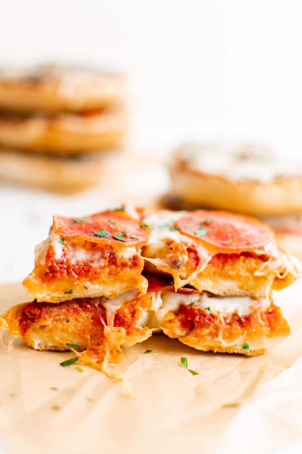 pizza bagel sliced in half and stacked