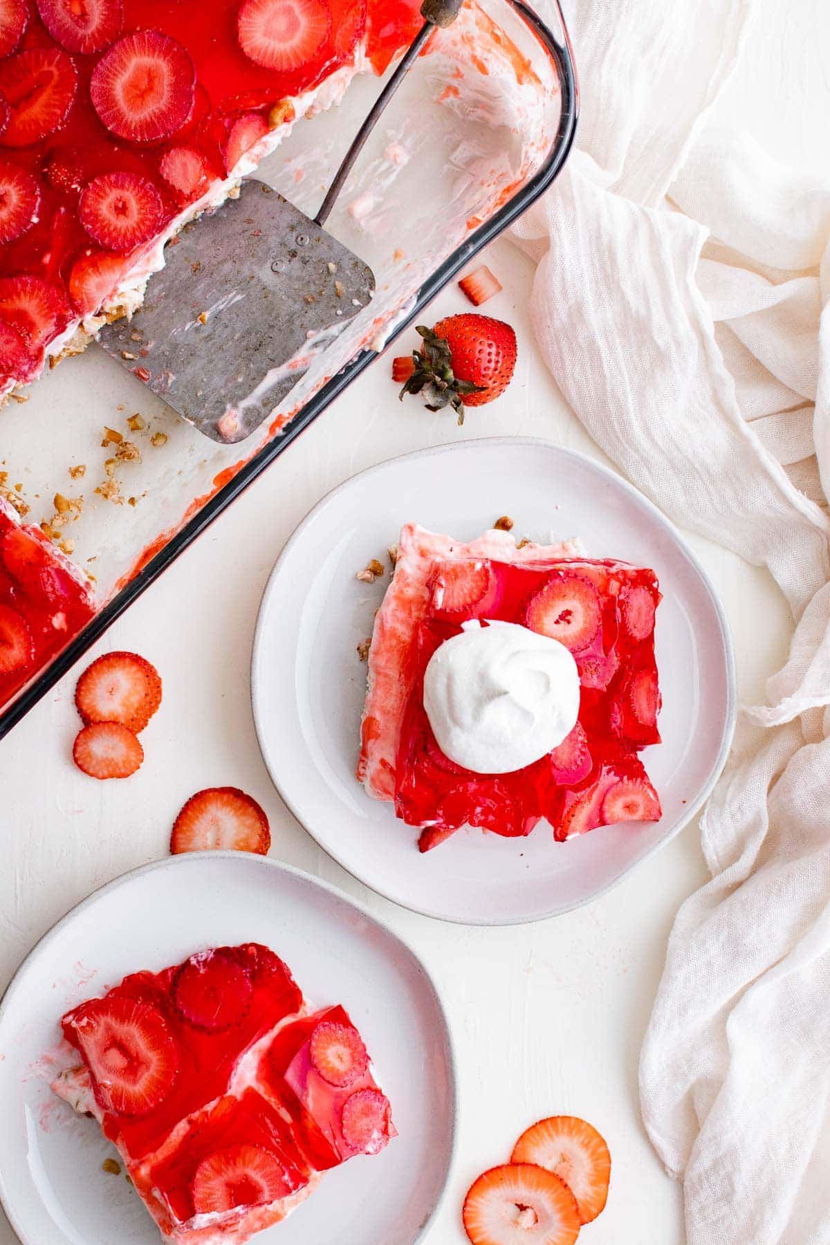 strawberry jello salad on plates