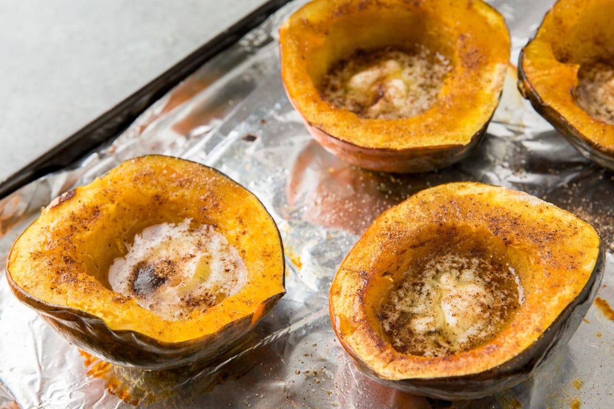 roasted acorn squash with melted butter and spices
