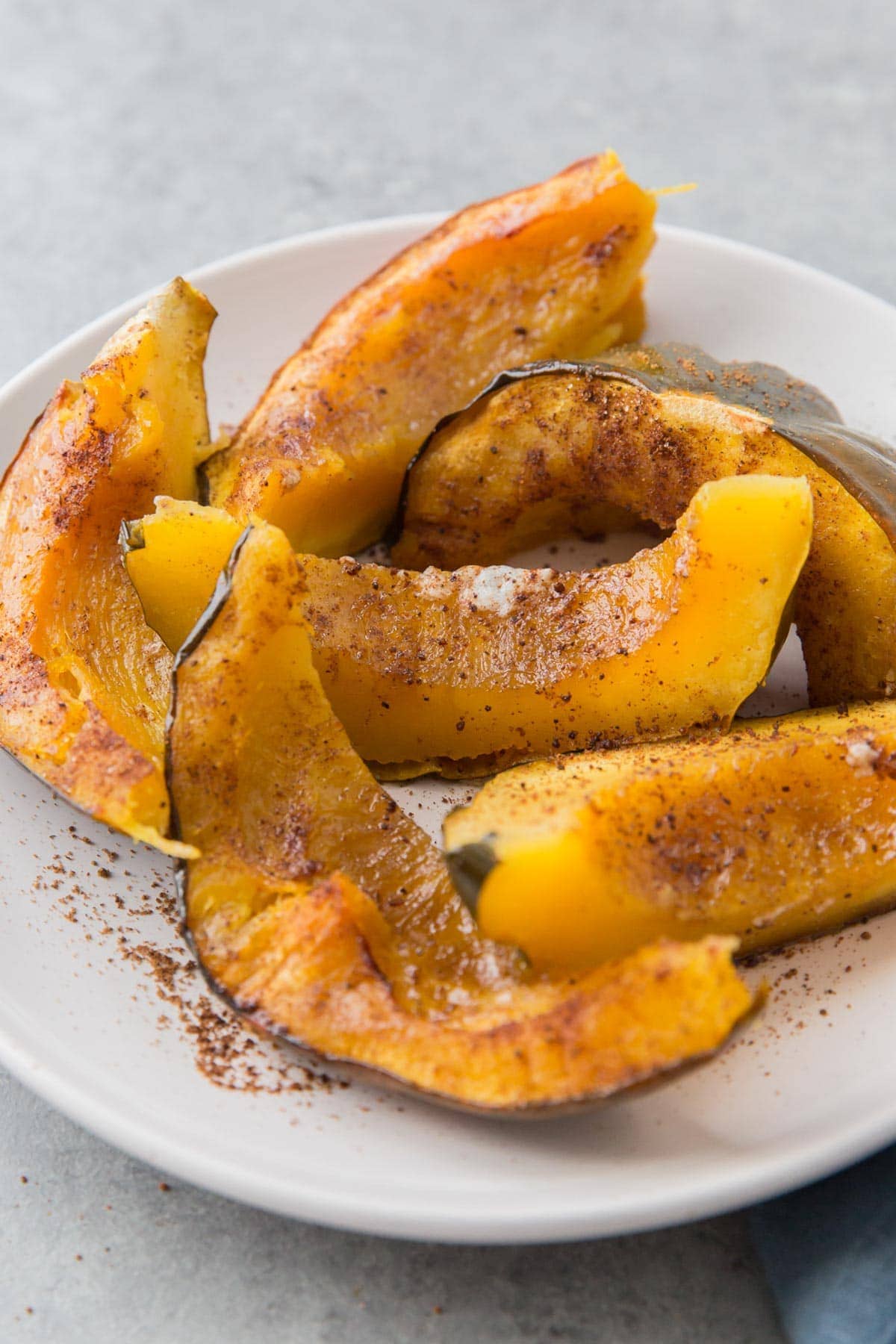 baked acorn squash sliced into wedges