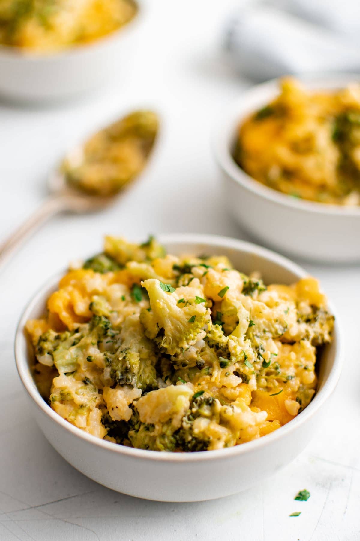 unbaked rice and broccoli casserole with shredded cheese