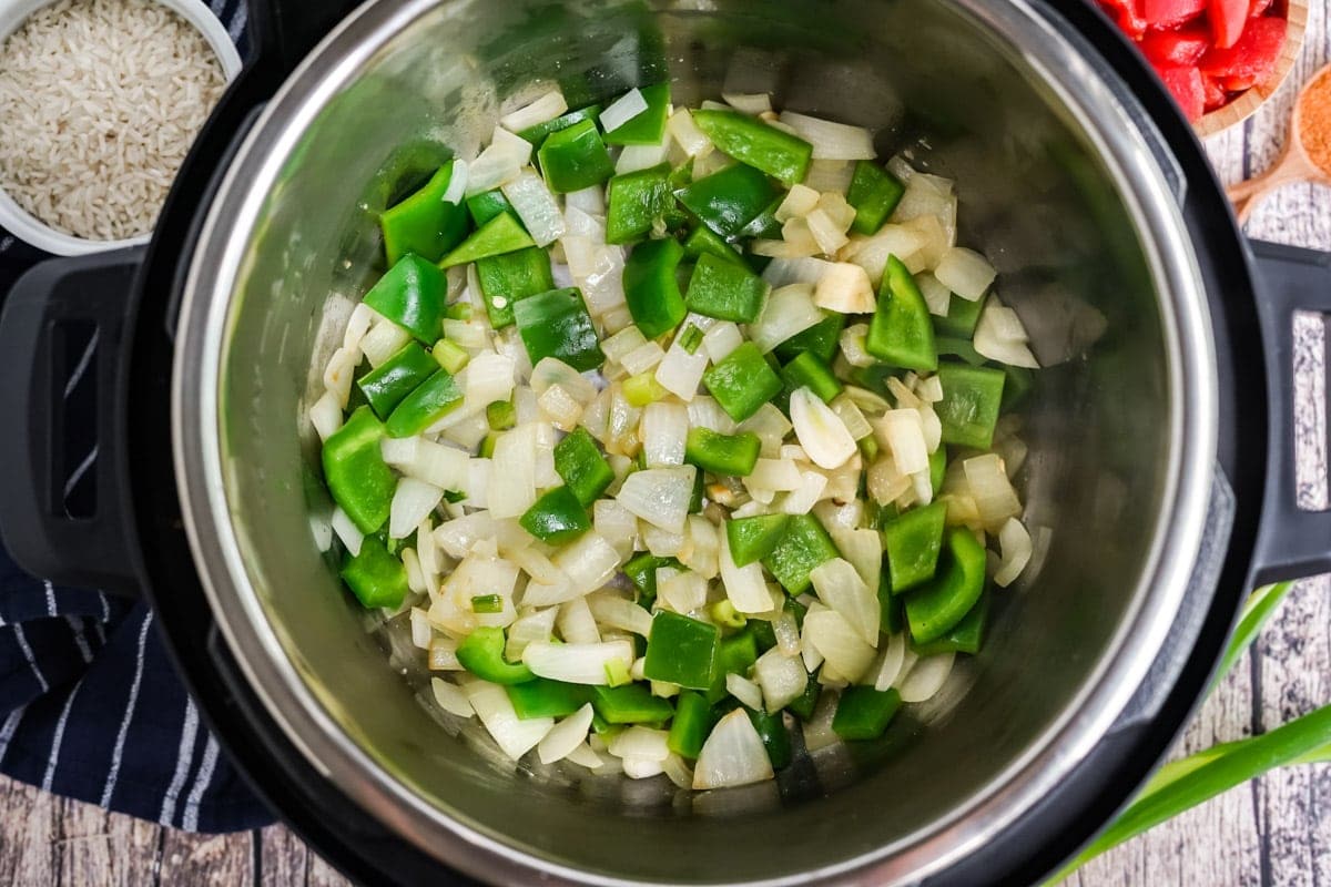 onions, bell pepper and celery in an instant pot