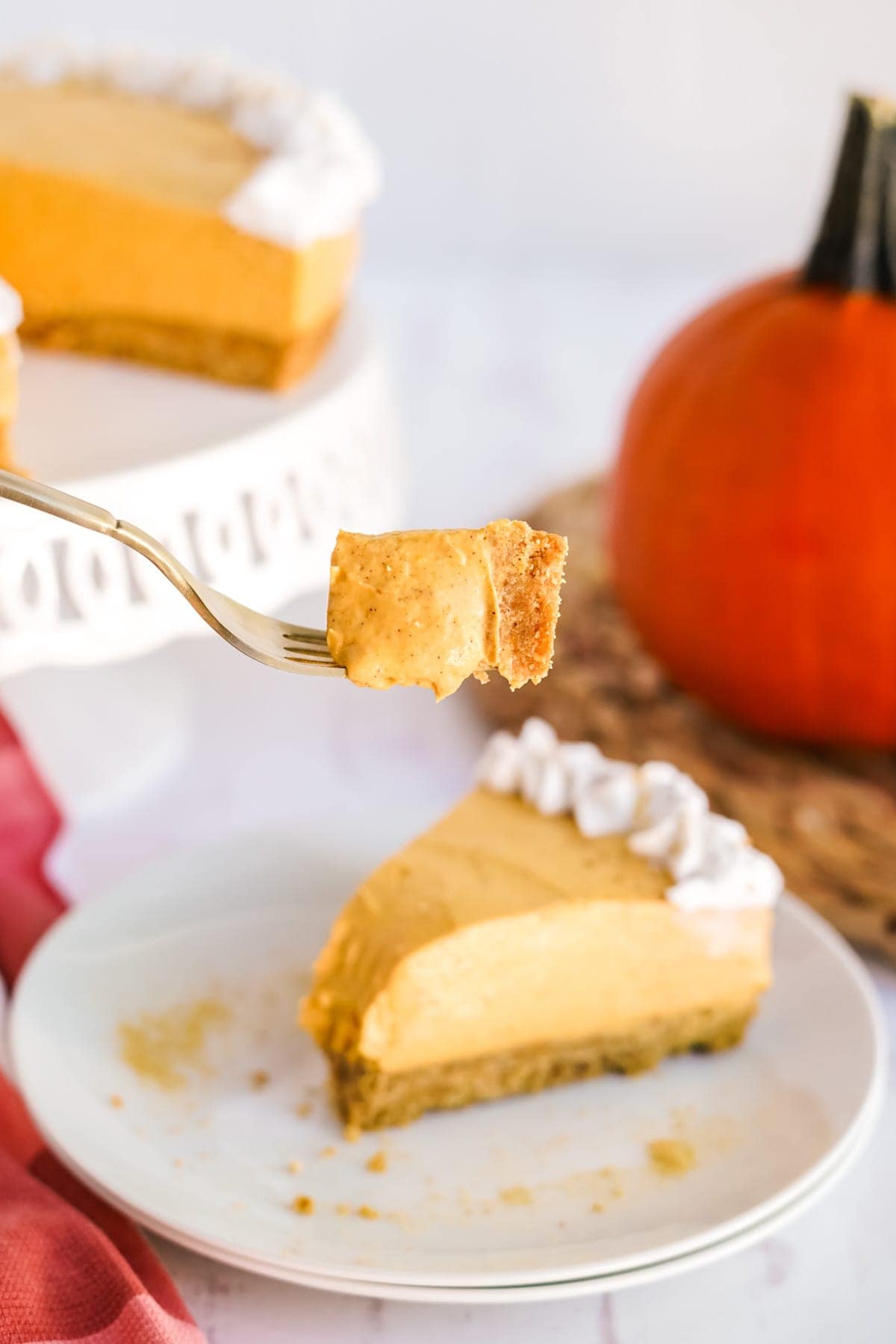 a piece of cheesecake on a fork.