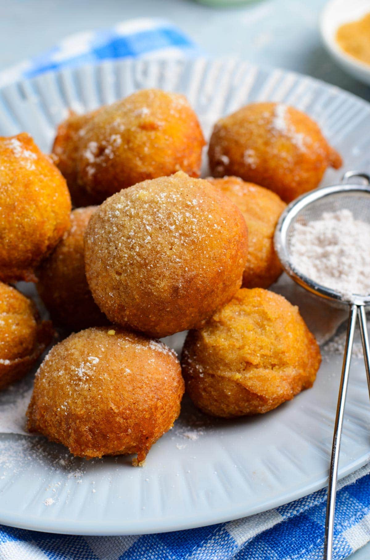 fritters made from pumpkin on a white plate