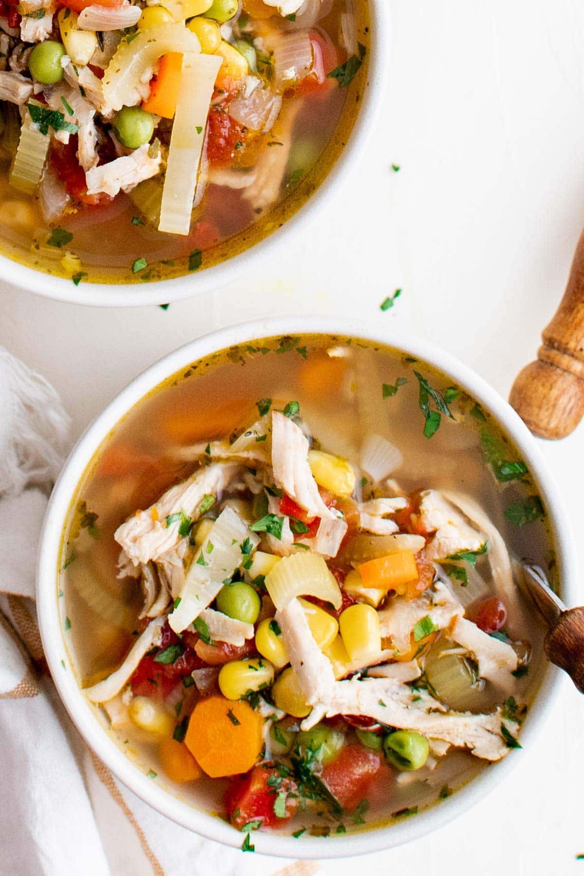 turkey soup in a white bowl