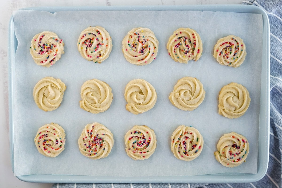 baked butter cookies on a cookie sheet