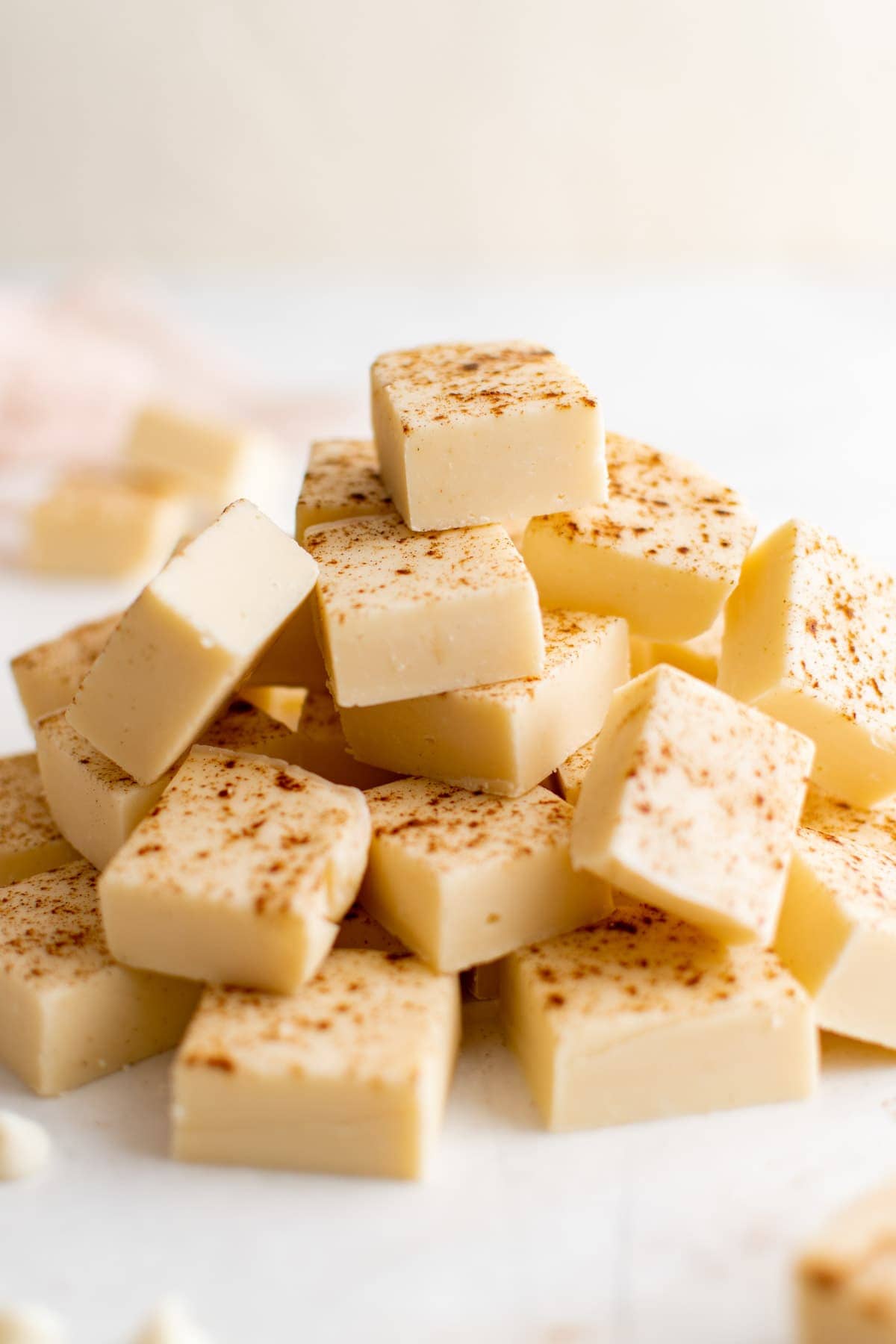 pile of cut squares of buttered rum fudge