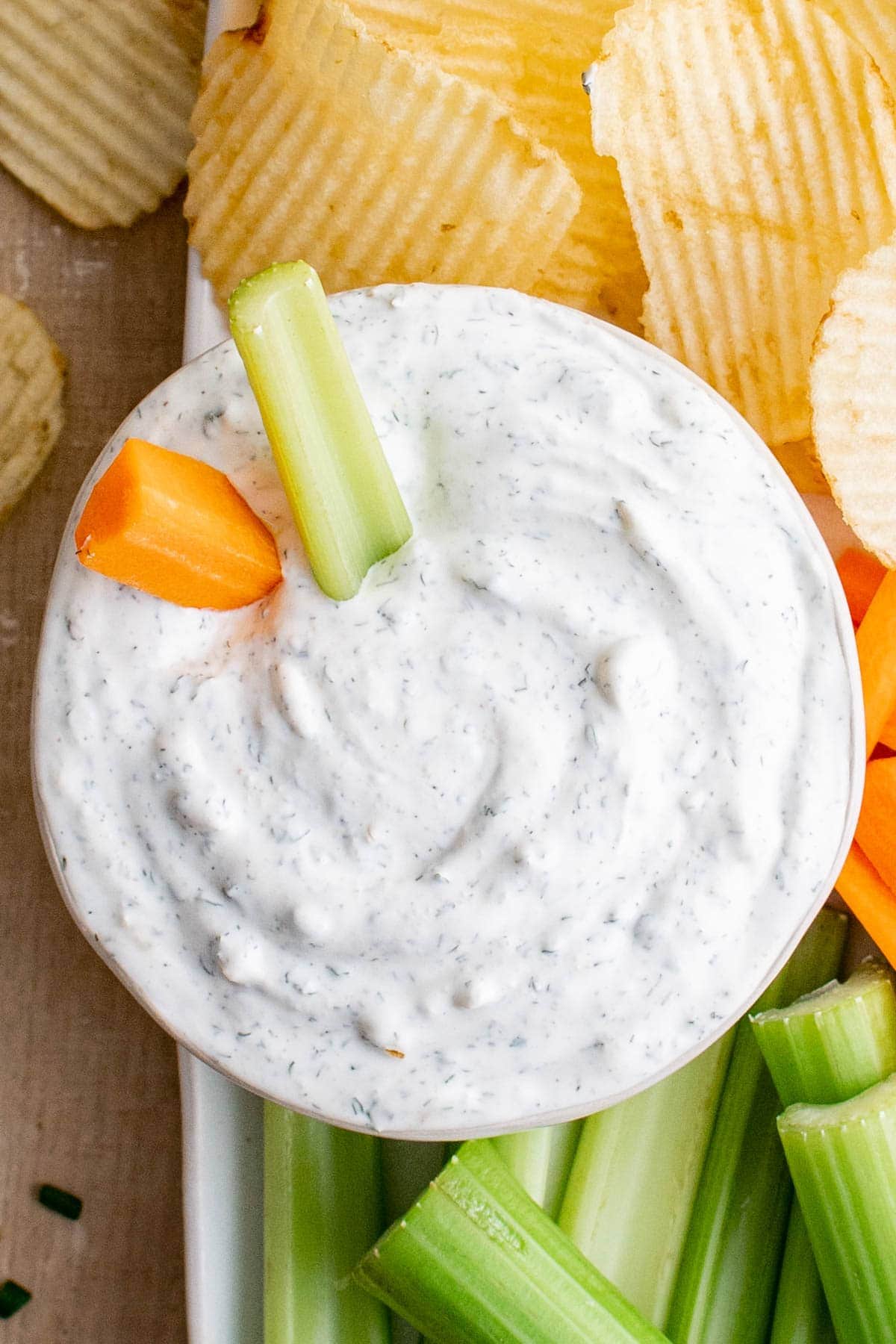 sour cream chip dip with carrot and celery