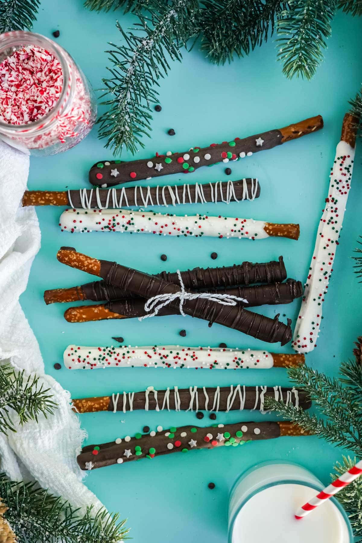 chocolate cipvered pretzels on a blue background