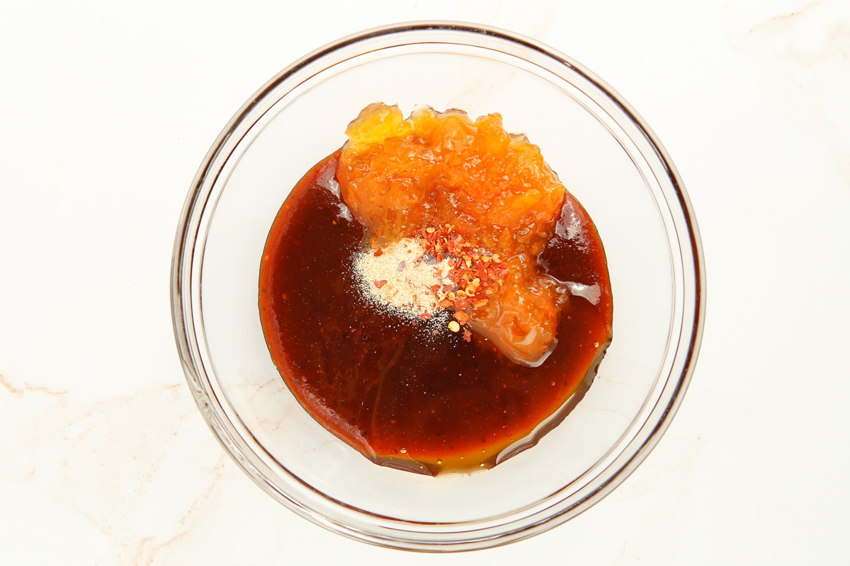 peach jam, bbq sauce and honey in a small dish