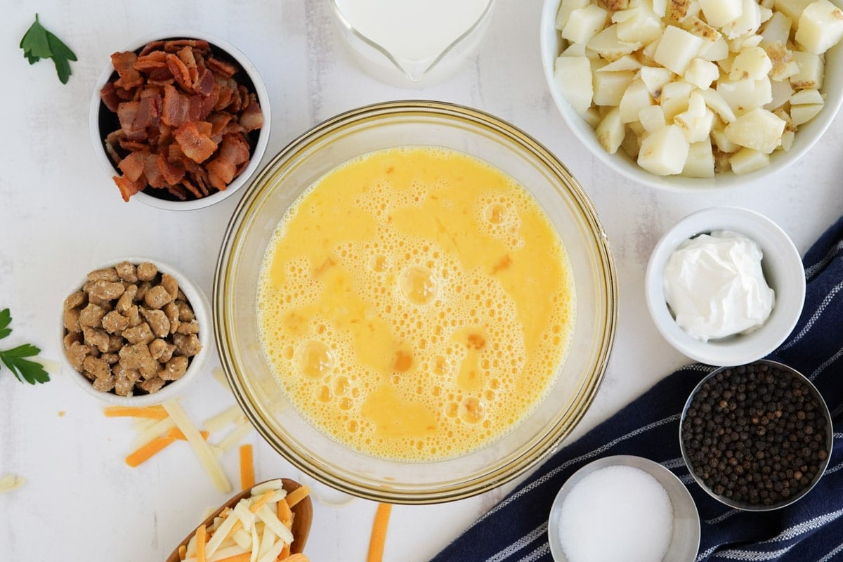 whisked eggs in a glass bowl