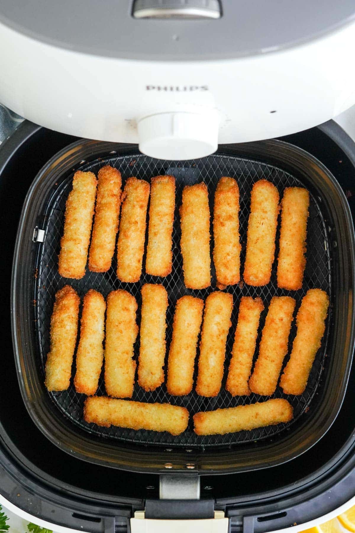 fish sticks in an air fryer basket