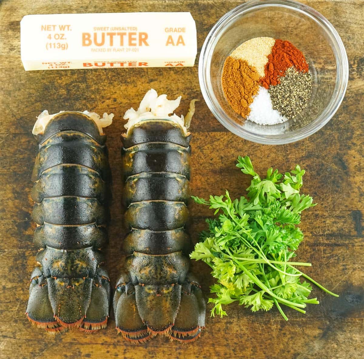 2 lobster tails, butter, parsley and seasonings