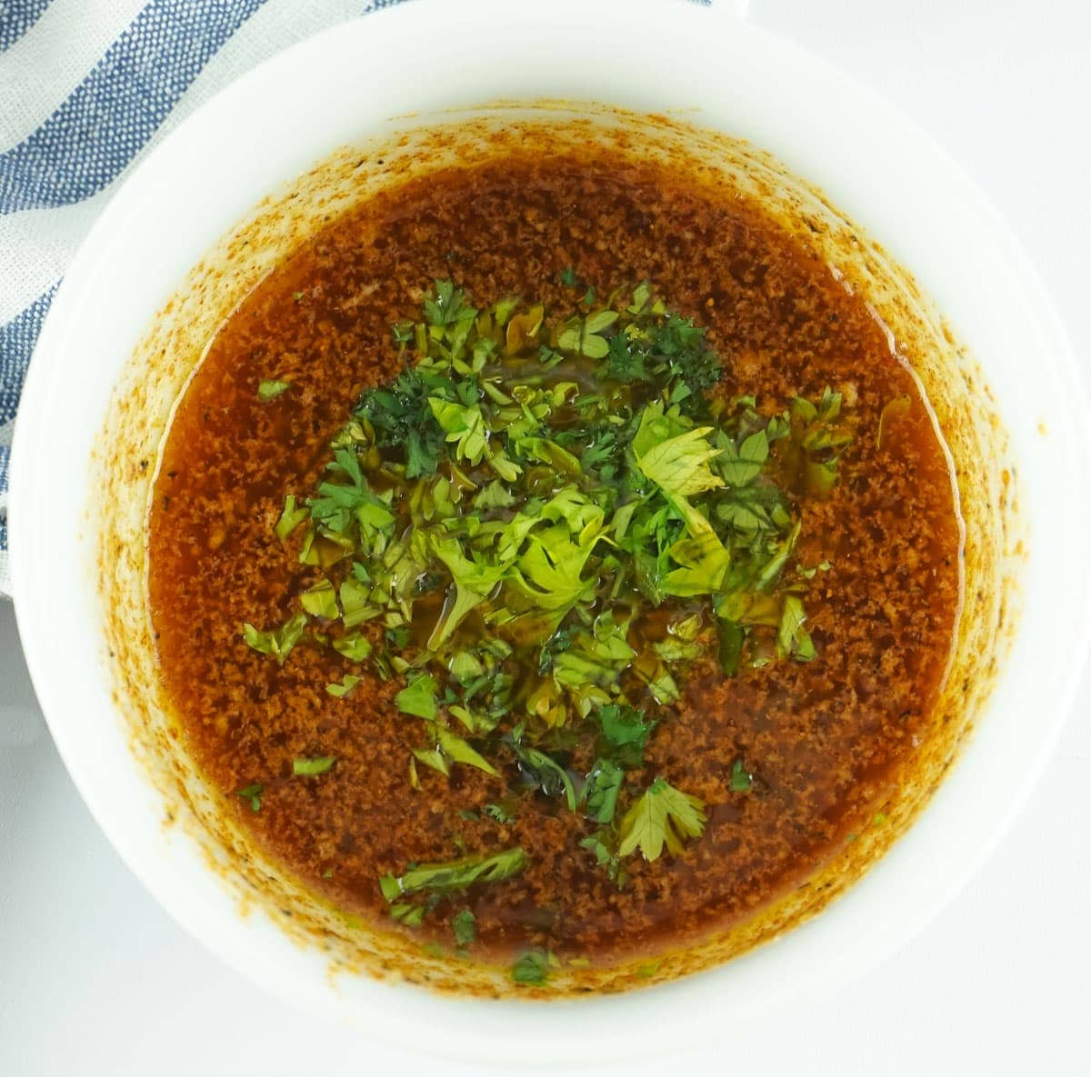 melted butter with spices and parsley