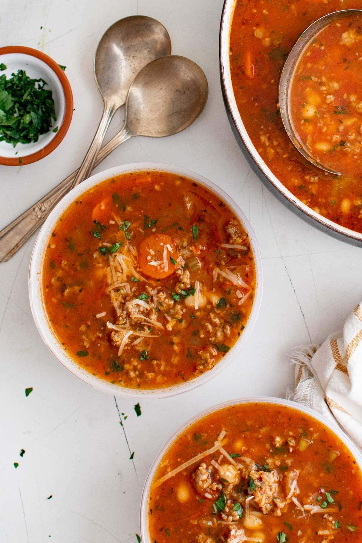 bowls of italian bean soup, spoons