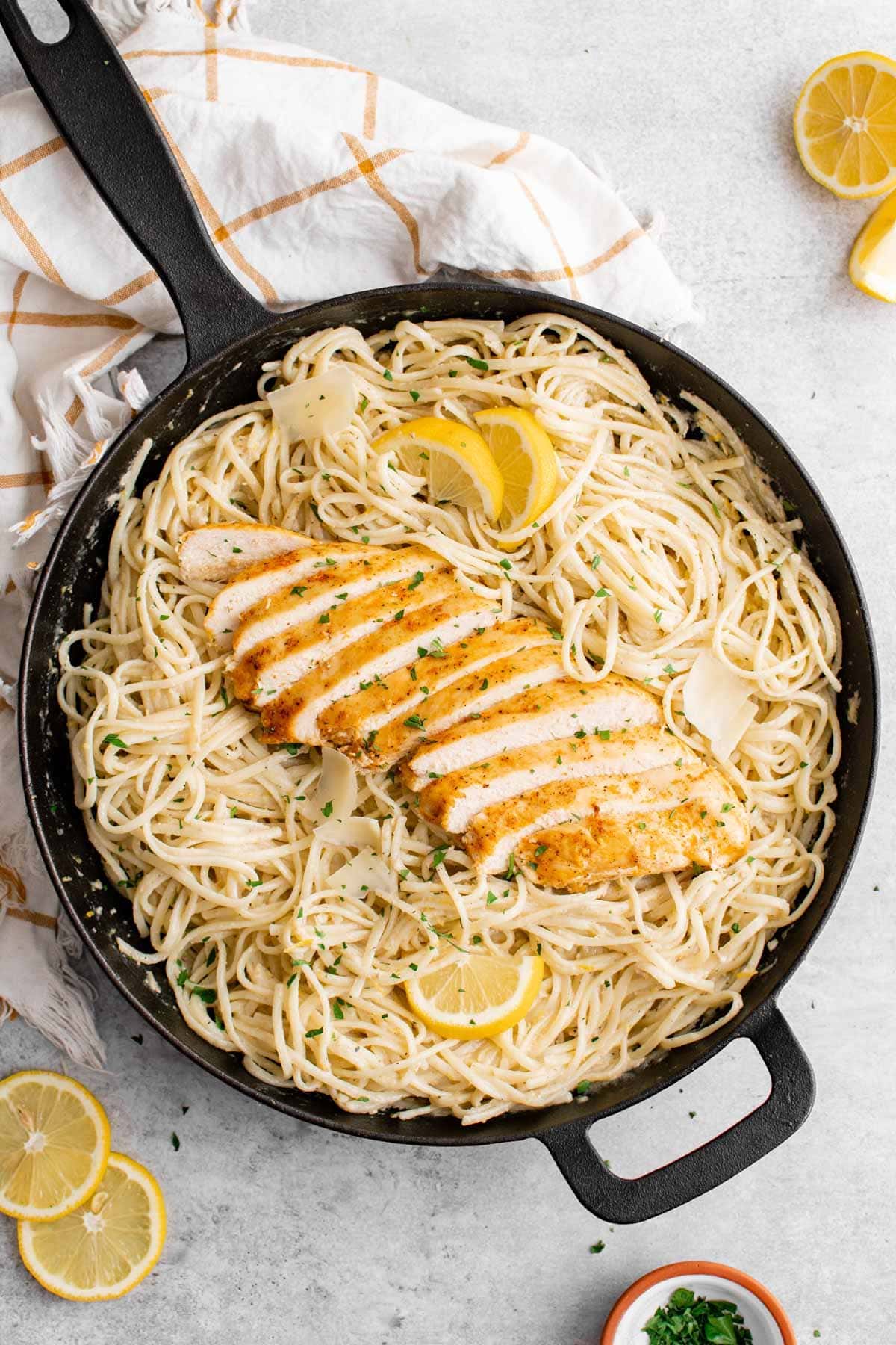 lemon butter pasta with chicken in a cast iron skillet