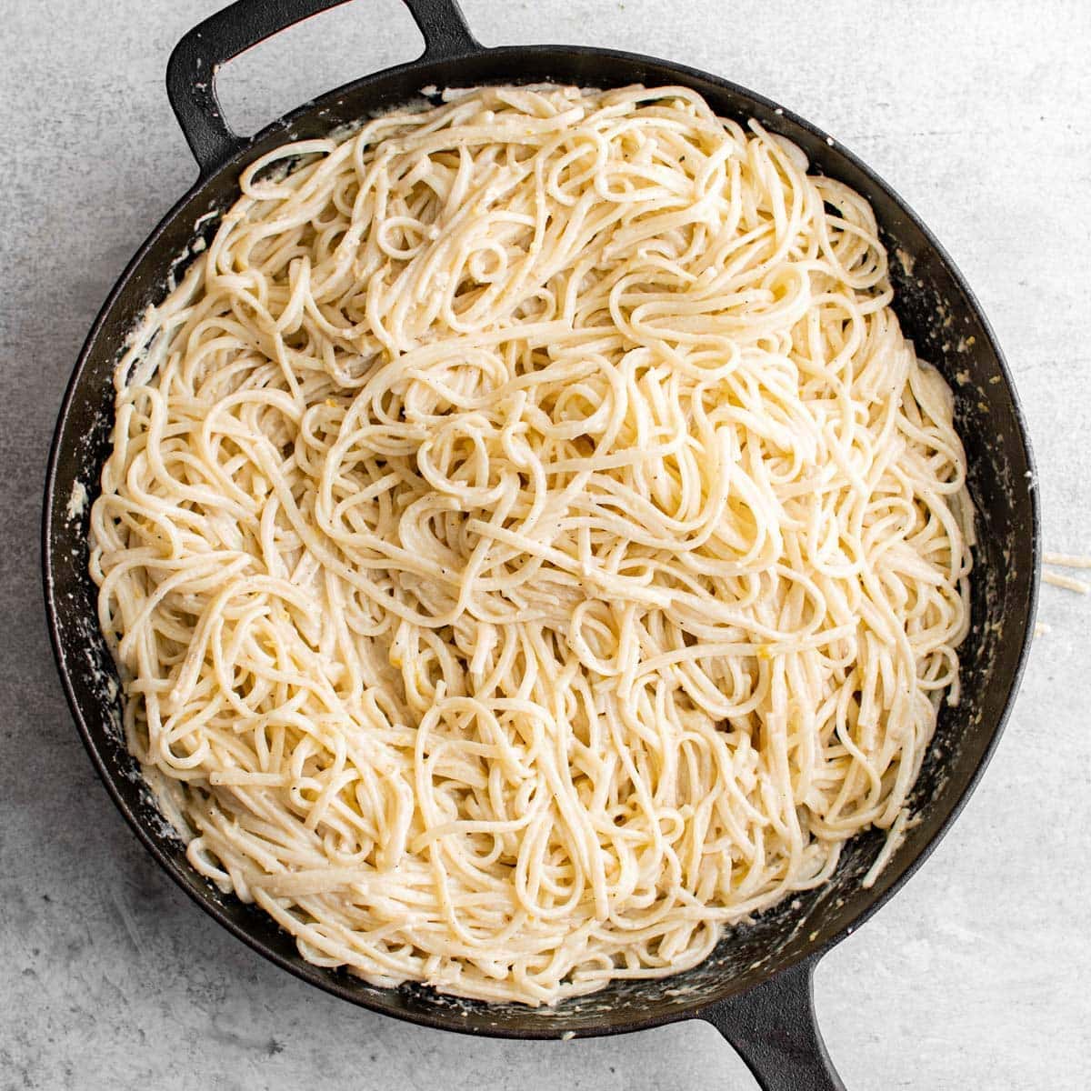 lemon butter pasta in a cast iron skillet