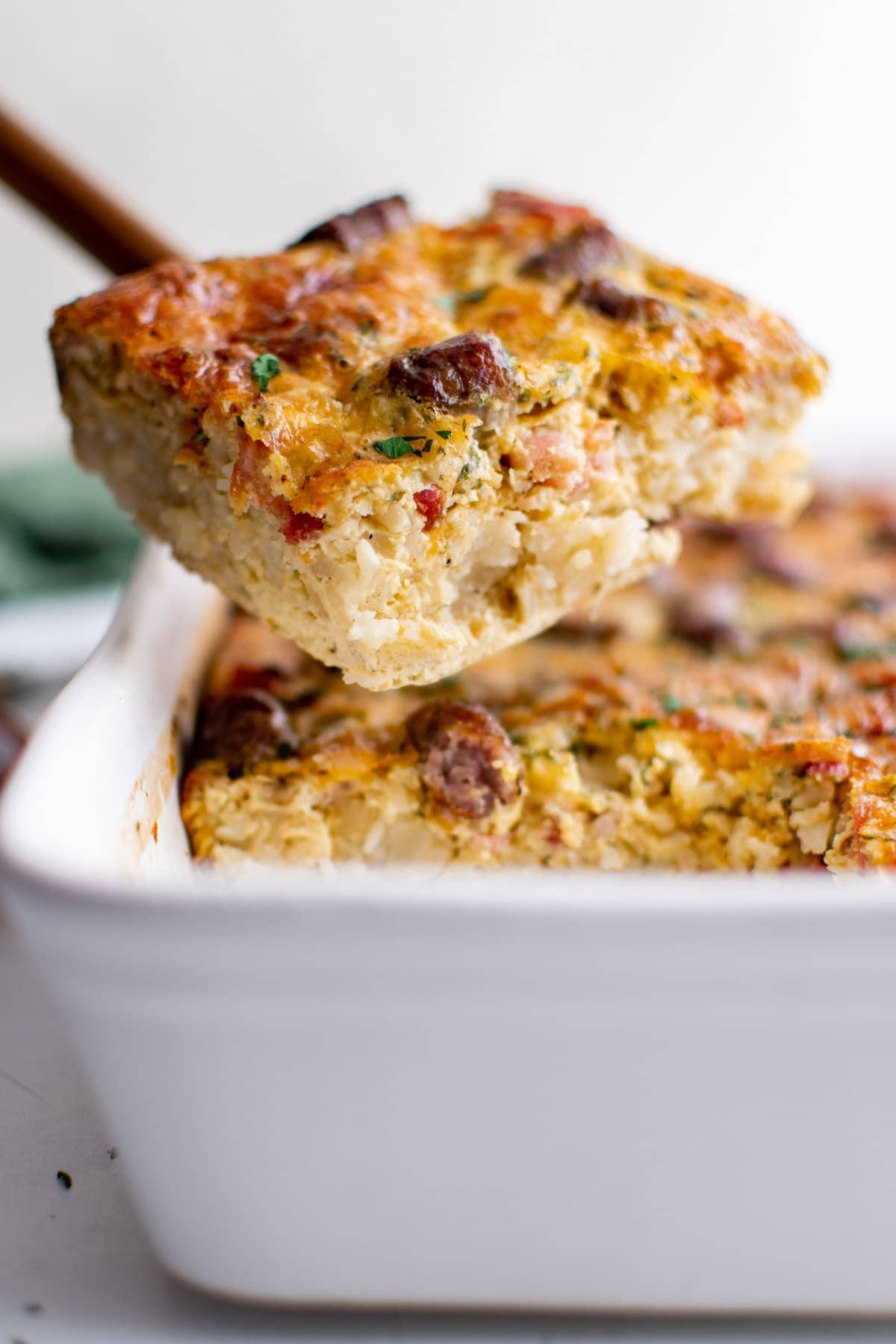 slice of breakfast casserole on a spatula