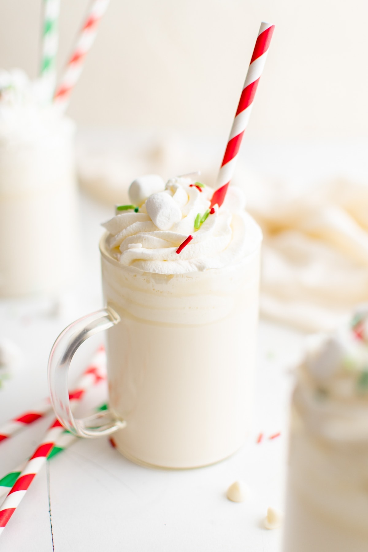 hot chocoalte made with white chocolate and a red straw