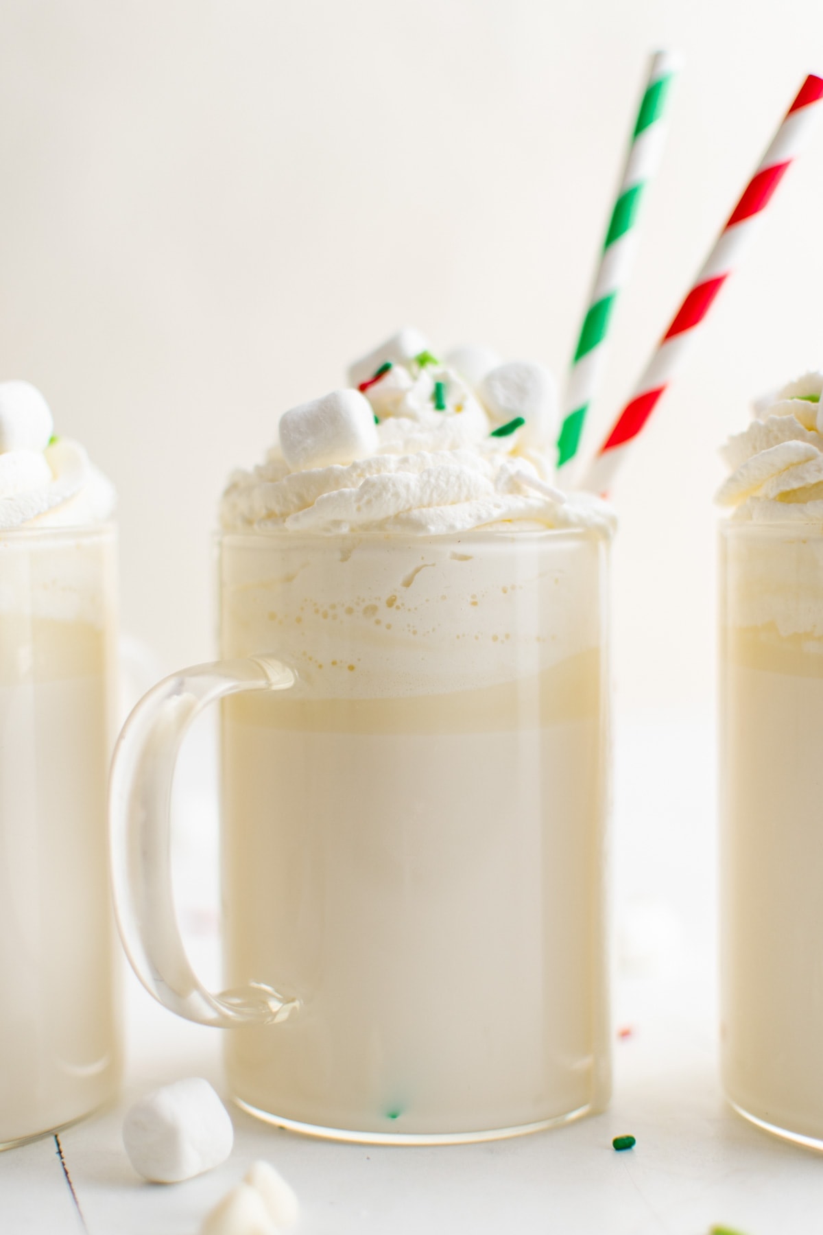 white hot chocolate in a mug with two straws