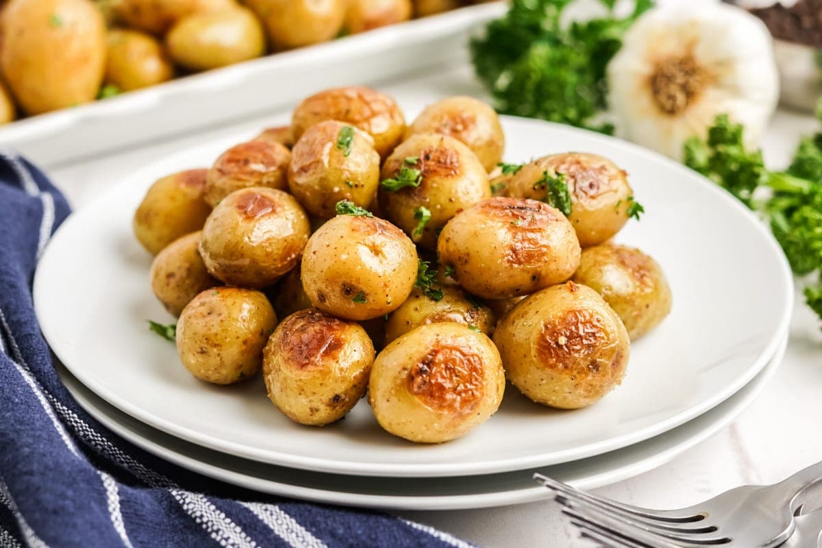 roasted baby potatoes on a white plate
