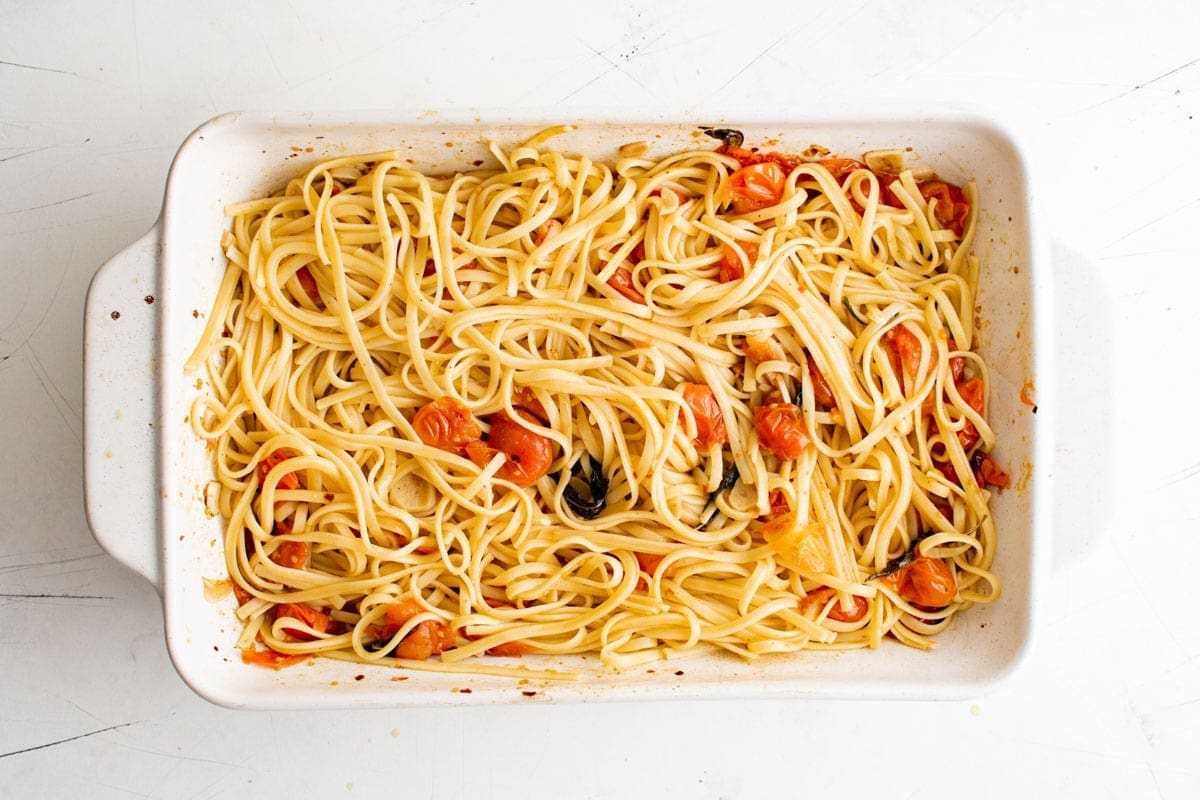 baking dish with pasta and roasted cherry tomatoes