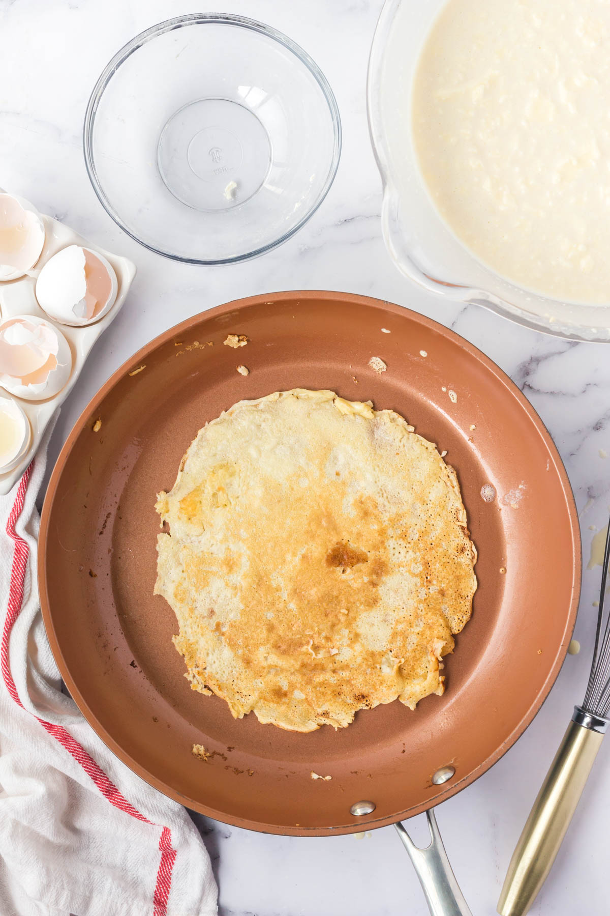 thin pancake in a brown skillet