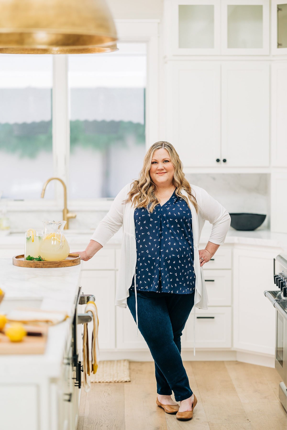 woman standing in a kitchen