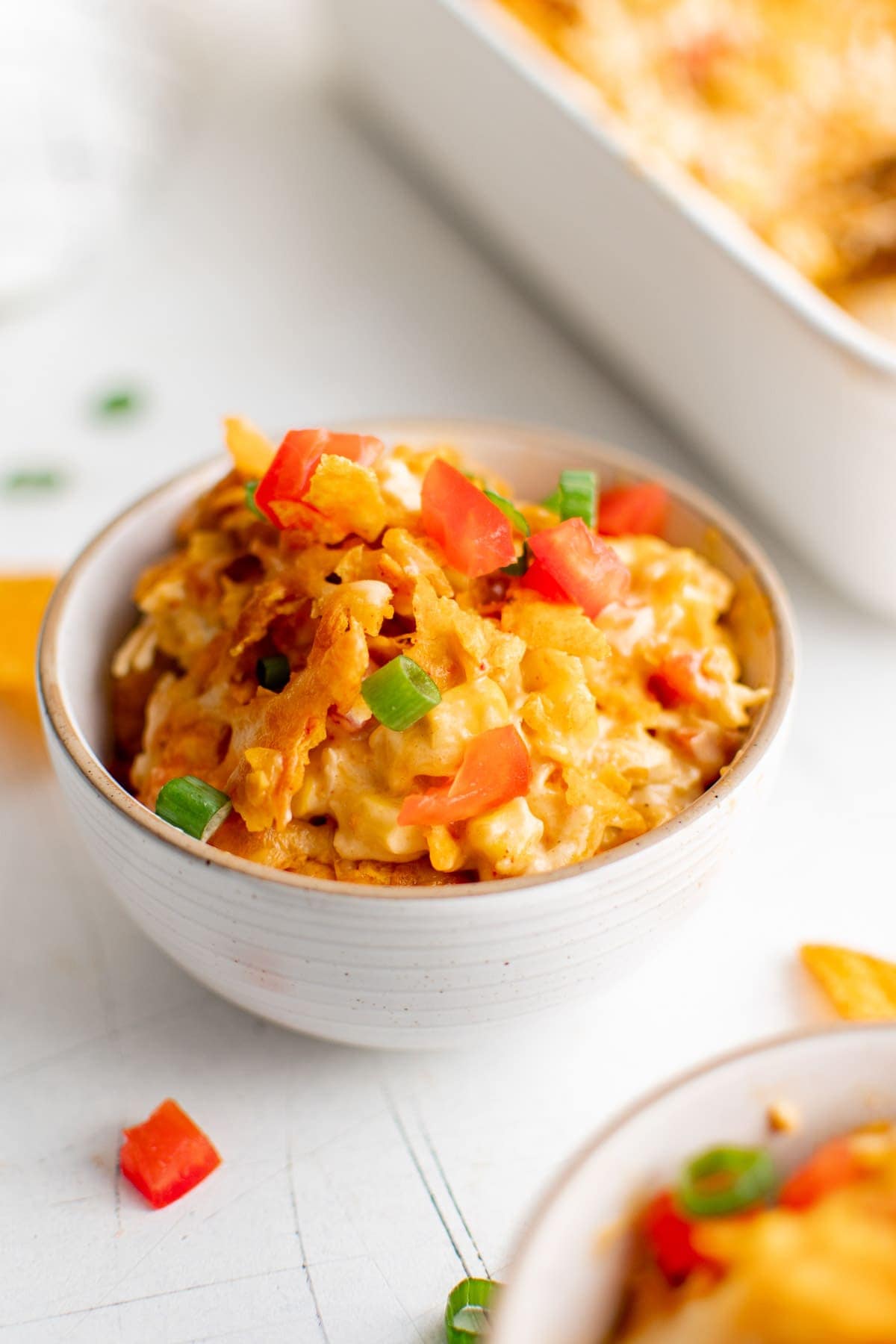 a small bowl with chicken dorito casserole