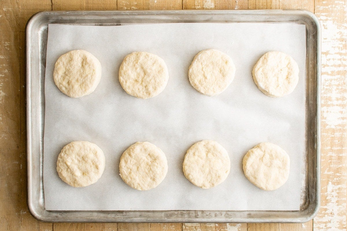 biscuit dough rounds on a baking sheet