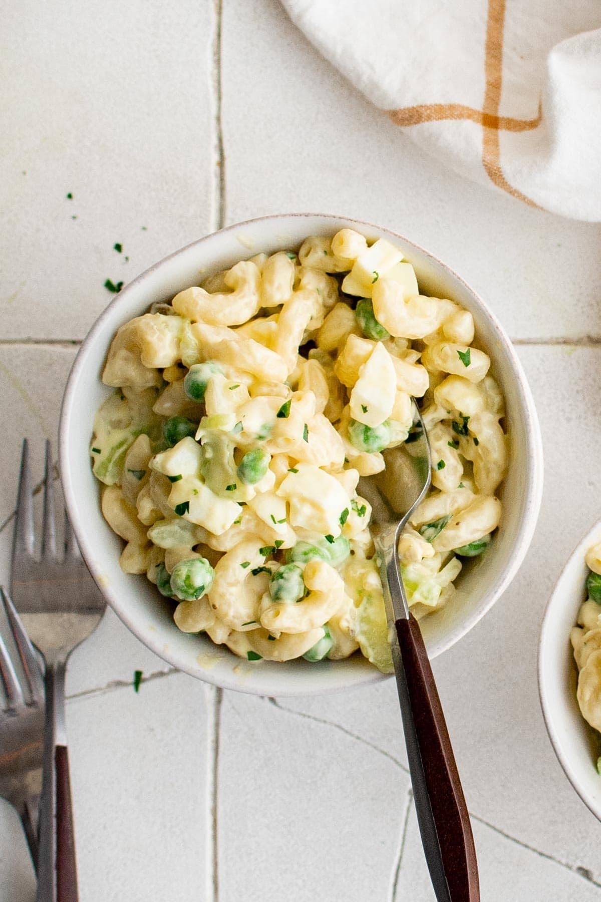 serving of macaroni salad in a bowl with a fork