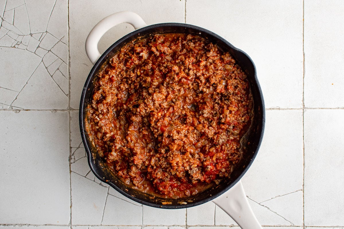 ground beef and marinara sauce in a skillet