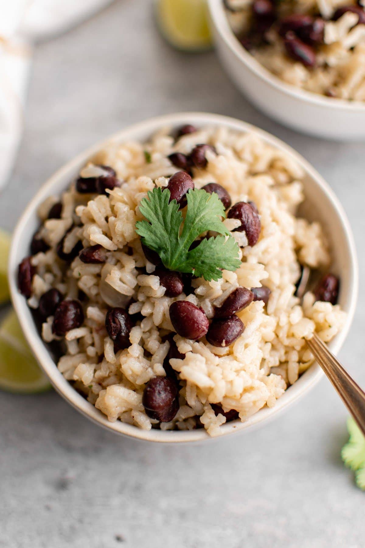 a small bowl with a serving of black beans with rice