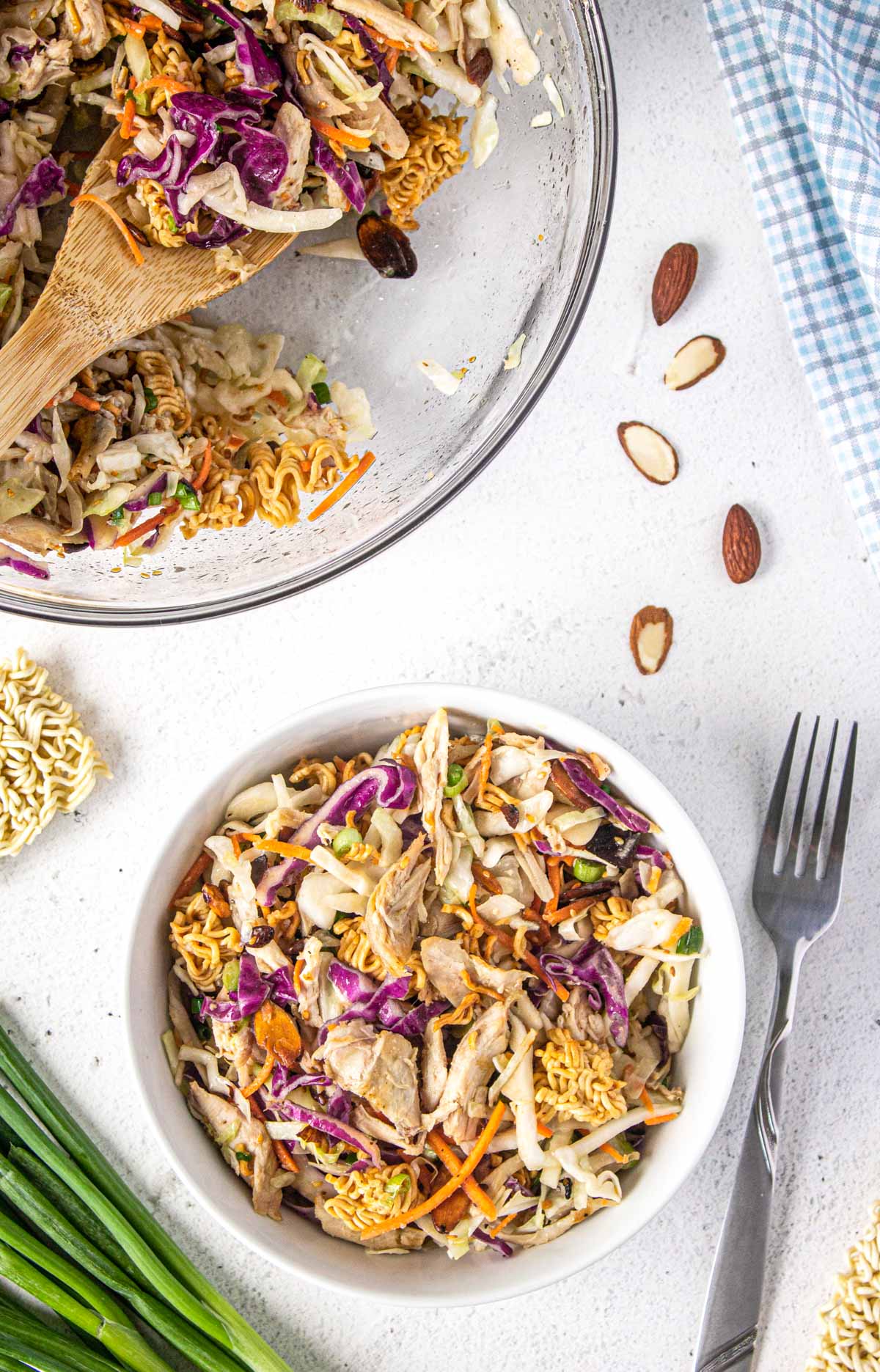 ramen chicken salad in a bowl with a fork