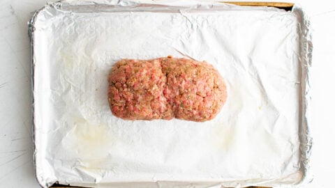 meatloaf formed on to a baking sheet