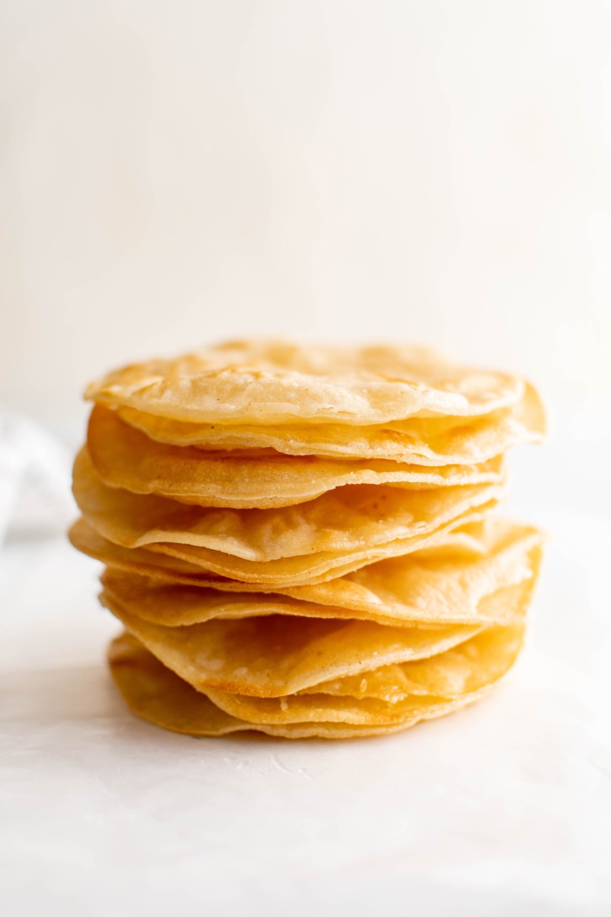 Tostada shells stacked.