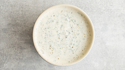 Creamy green goddess dressing in a bowl.