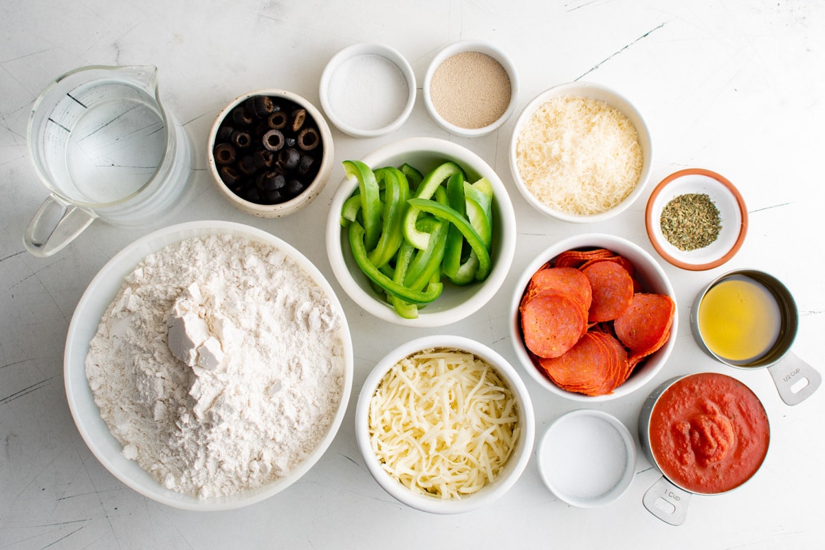 Ingredients needed to make sheet pan pizza.