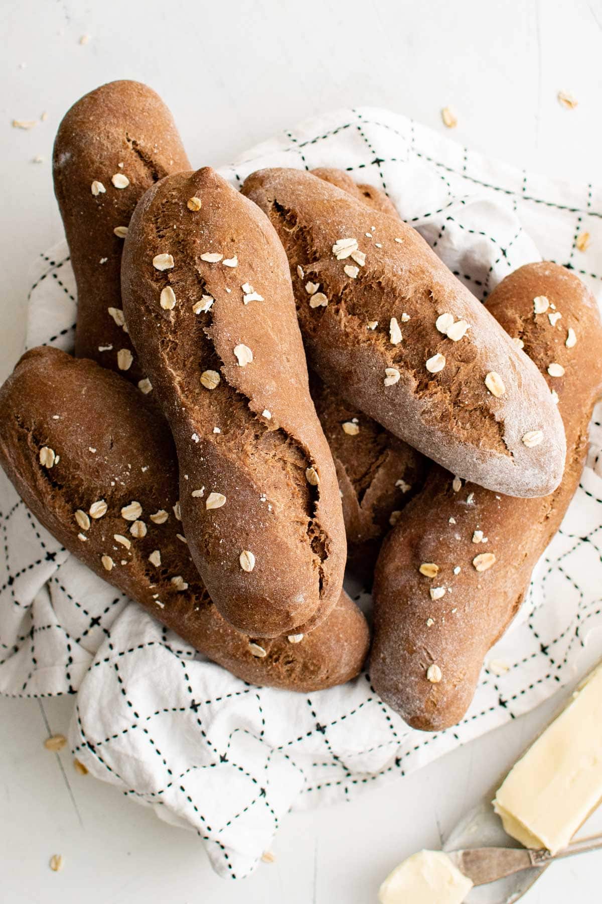 Loaves of brown bread in a basket. 