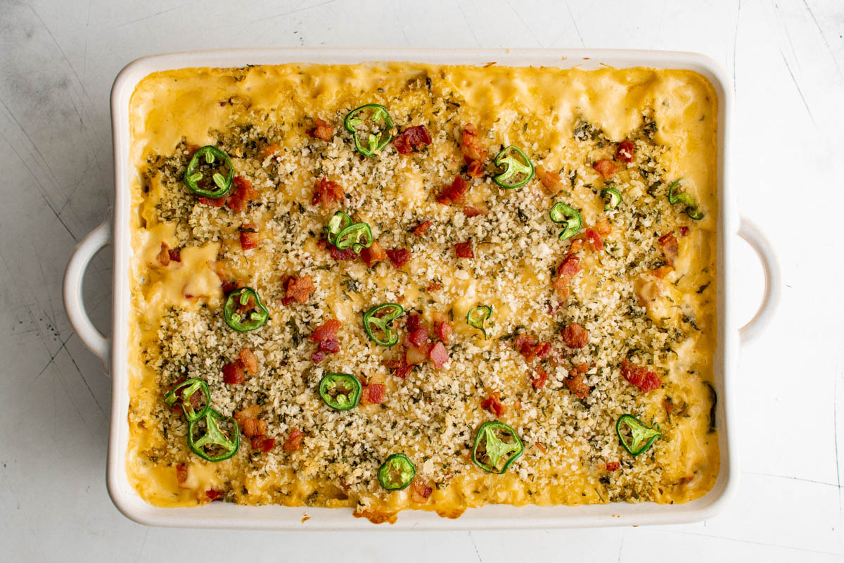 Broiled baked mac and cheese with crispy topping, bacon and jalapenos. 