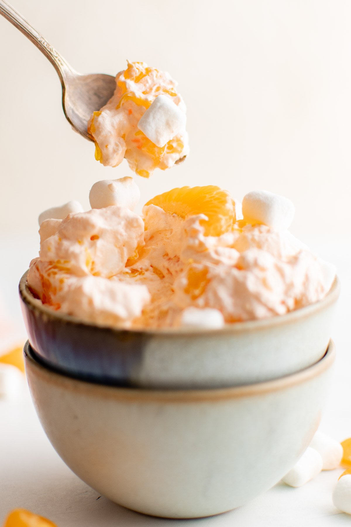 Bowls with mandarin orange salad. 