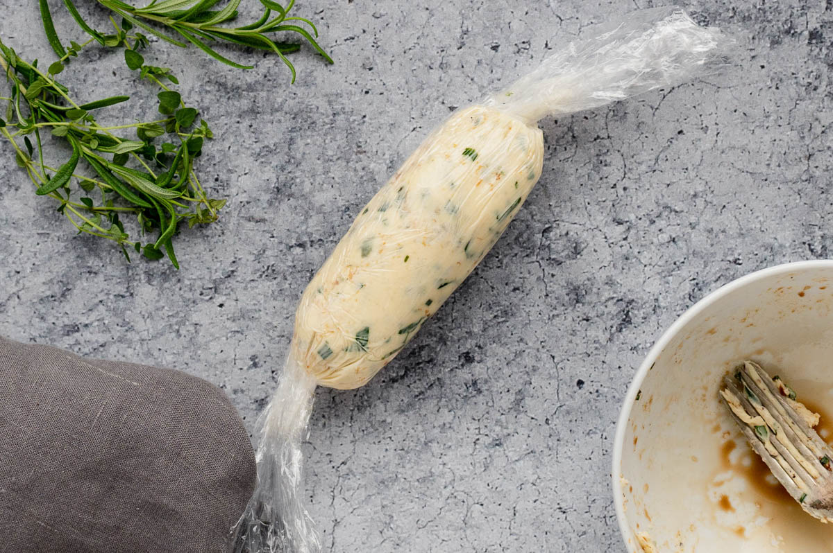 Compound butter rolled into a log and wrapped in plastic wrap.