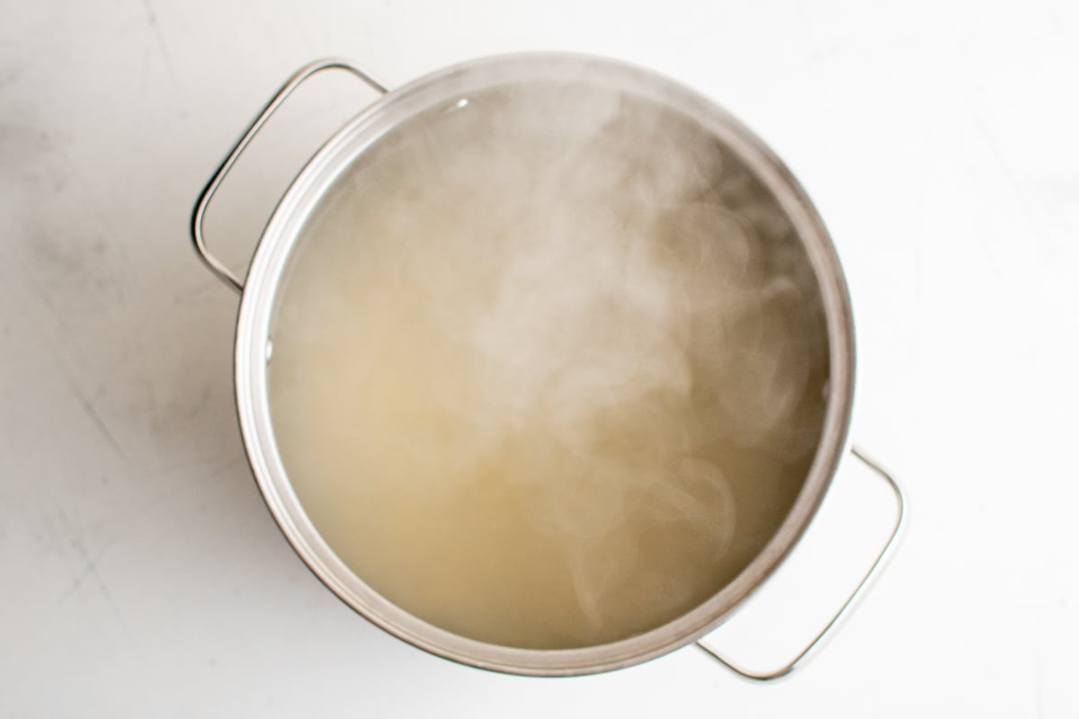 Liquid simmering in a soup pot.