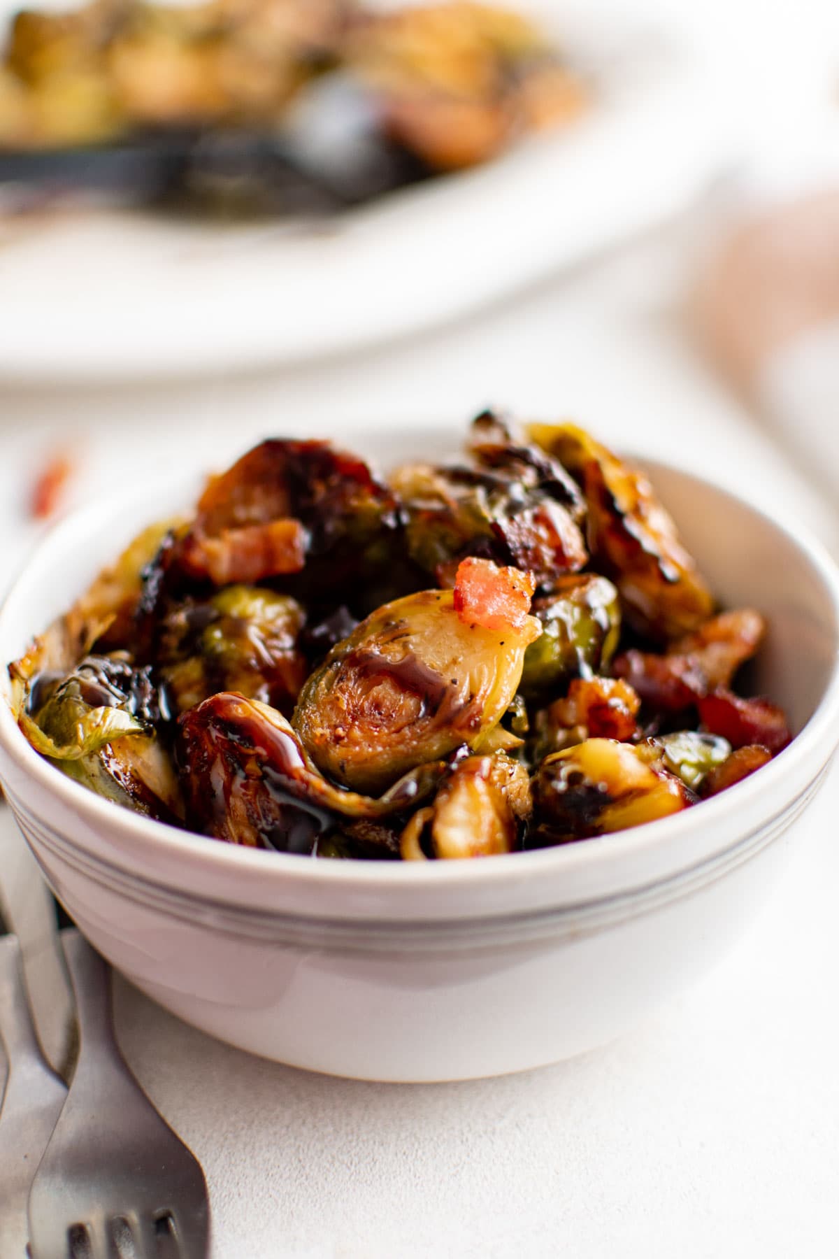 Small bowl of brussels sprouts with bacon.